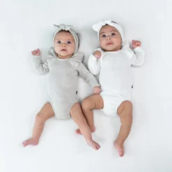 Ribbed Long Sleeve Ruffle Leotard In Cloud -Kyte Baby Shop kyte baby ribbed long sleeve ruffle bodysuit ribbed long sleeve ruffle leotard in cloud 32733048307823 scaled