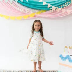 Short Sleeve Tiered Dress In Cloud Party -Kyte Baby Shop kyte baby short sleeve tiered dress short sleeve tiered dress in cloud party 32605506175087 scaled