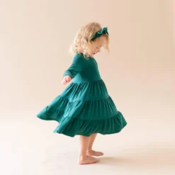 Long Sleeve Tiered Dress In Emerald 7 Long Sleeve Tiered Dress In Emerald -Kyte Baby Shop kyte baby toddler long sleeve tiered dress long sleeve tiered dress in emerald 30294998777967